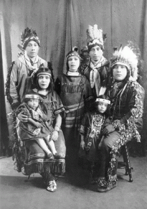 Elmira Miguel (Rappahannock: seated, holding Gloria), Antonio Miguel, aka Eagle Eye (Kuna), Lisa (standing in front of Antonio) 