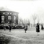 Gym Class, late 19th or eary 20th century with Alumnae Hall in Background