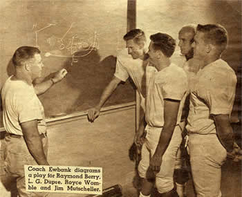 Weeb Ewbank Diagramming a Play on a Chalkboard for the Baltimore Colts